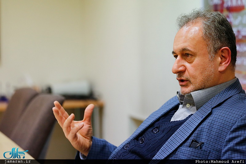 حسن تاش - اقتصاددان